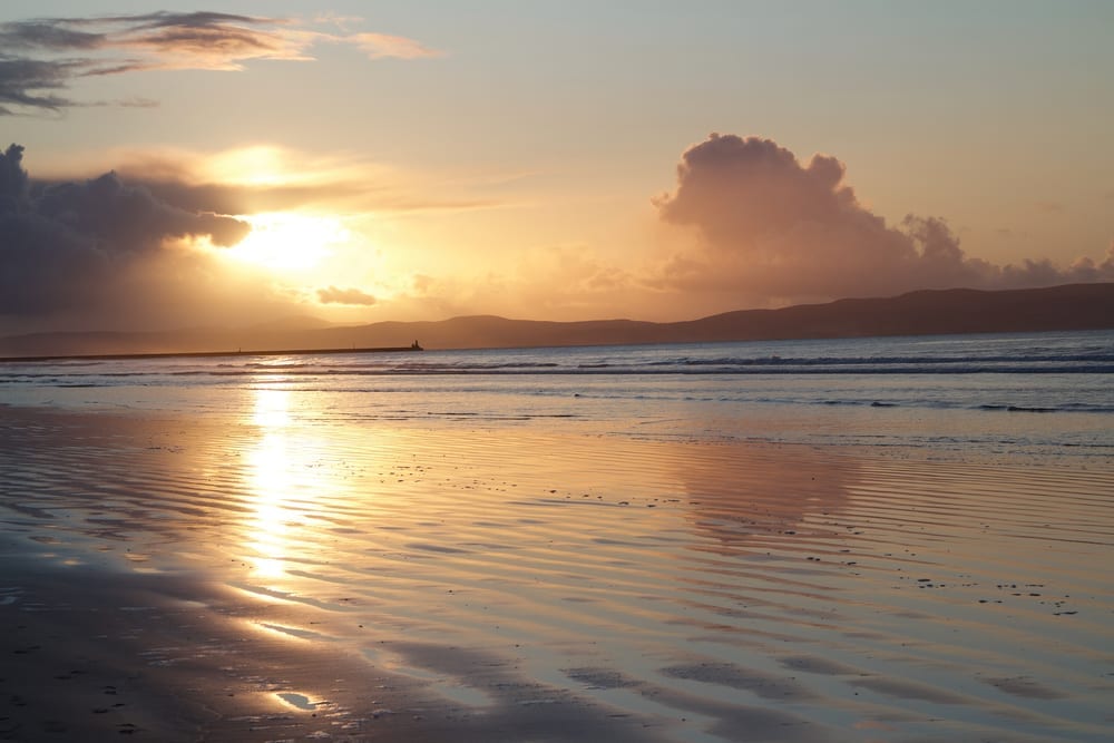 Sunset on Portstewart Strand beach, along the North Coast