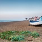 The shingle beach and pretty seaside town of Aldeburgh on the Suffolk coast