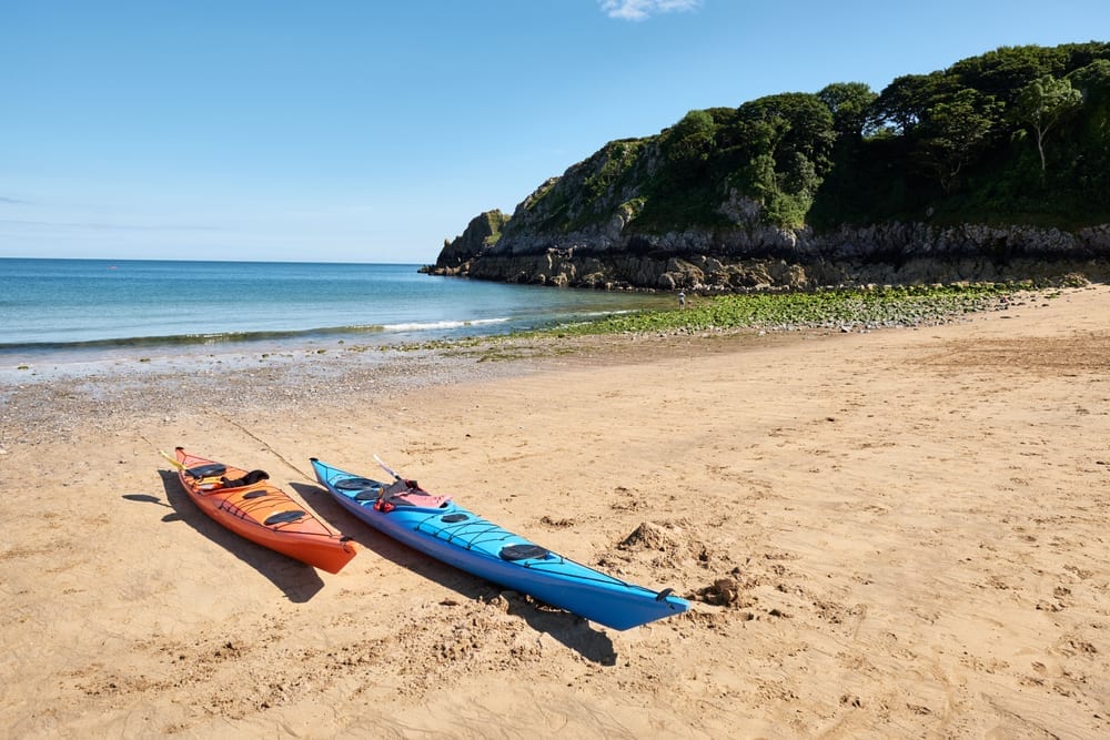 Two canoes on the beach, Barafundle Beach,Bay