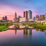 Columbus, Ohio, USA skyline on the river at dusk