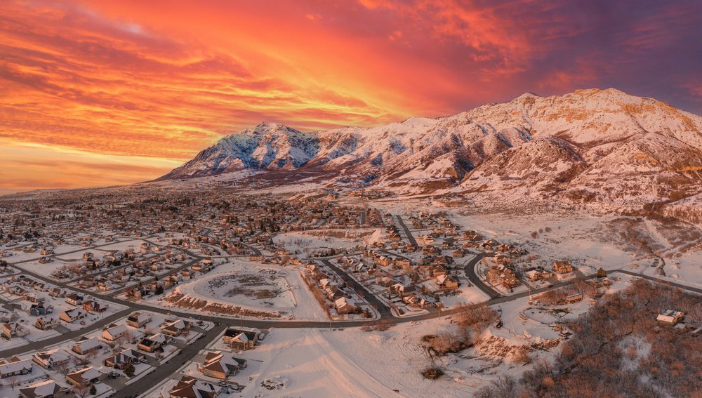 Aerial drone view high above the neighborhoods of North Ogden