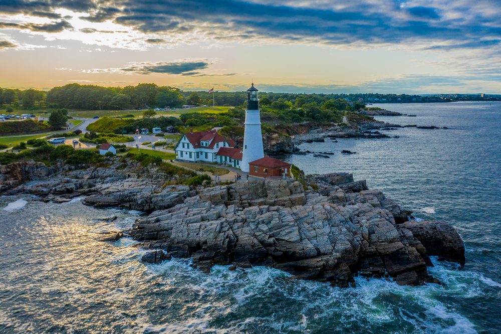 Aerial view of the Portland Head Lighthouse at sunset