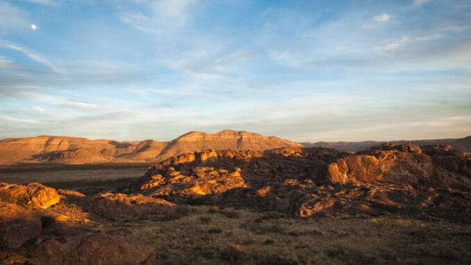 The sun setting across the mountains at Hueco Tanks in El Paso, Texas.