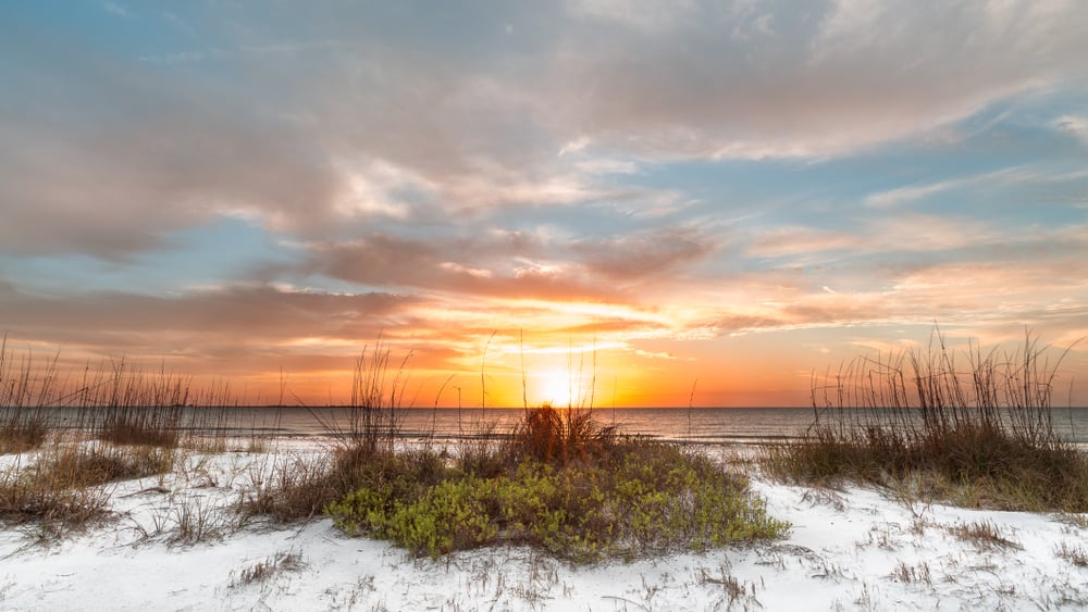 White sand beach at sunset at Fort Desoto Park in Saint Petersburg Florida