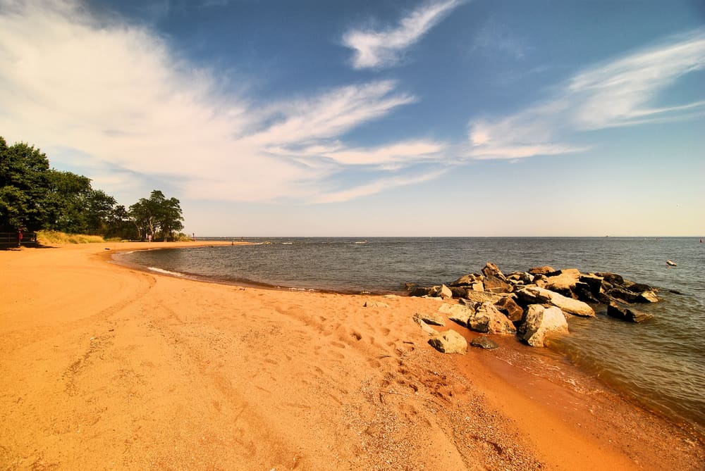 The red sandy beach of Sandy Point State Park near Annapolis, Maryland.