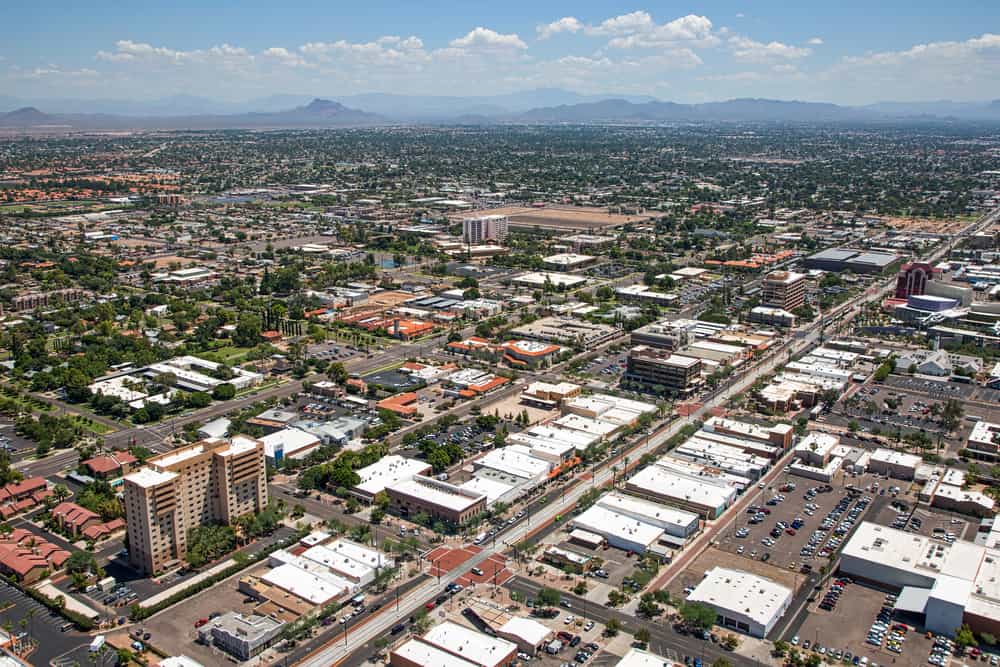 Aerial view of Main Street in downtown Mesa, Arizona with light rail transportation near completion
