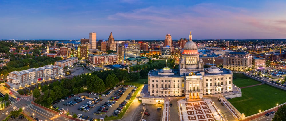 Aerial panorama of Providence skyline and Rhode Island capitol building at dusk. 
