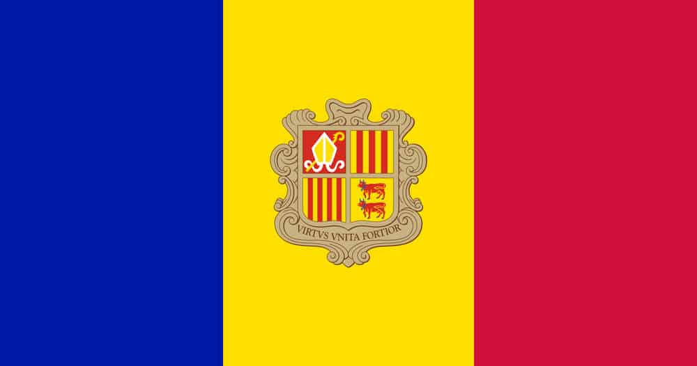 The national flag of Andorra with a vertical tricolour blue, yellow and red and an emblem in the center.
