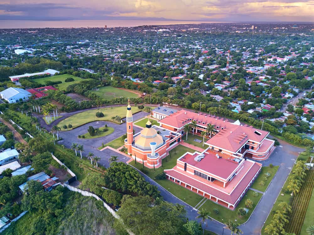 Cityscape of Managua city in Nicaragua at dusk time aerial view