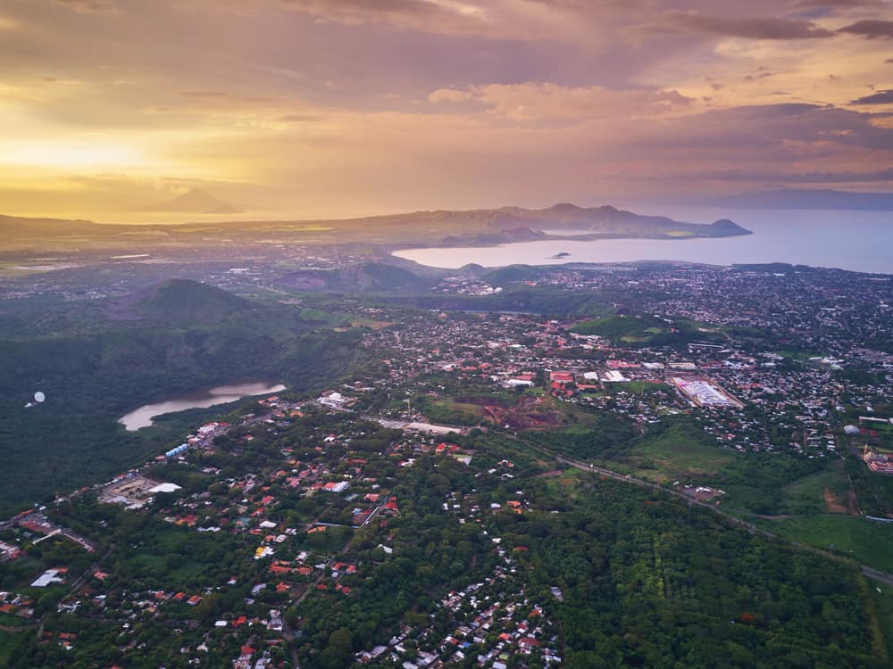 Cityscape of Managua town aerial view in sunset time